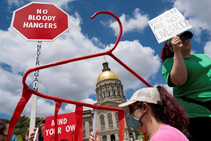 Abortion rights protesters rally in Atlanta. The prospect of the US Supreme Court ending federal abortion rights has split the US