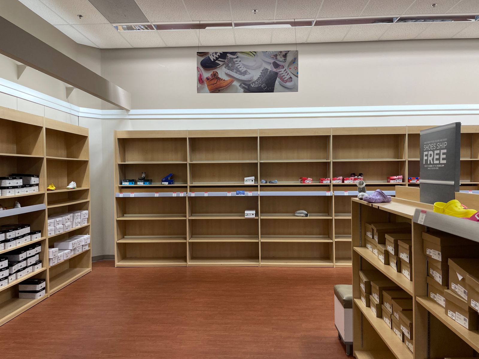 A row of empty shoe shelves