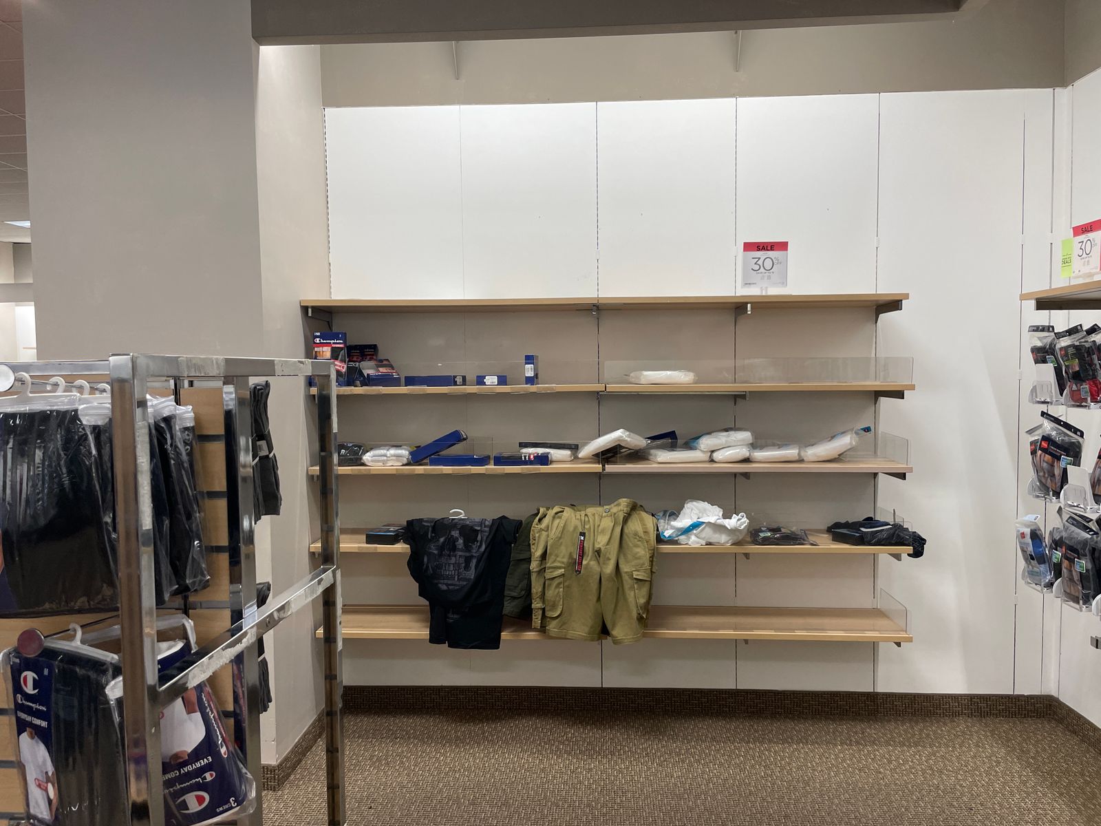 Sparse, messed apparel shelving