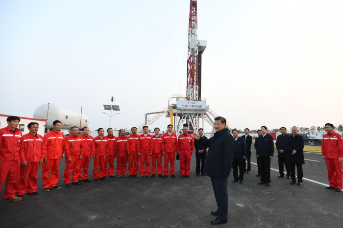 China’s president Xi Jinping addresses workers on an oil platform off eastern China, where he said: ‘Our energy rice bowl must be held in our own hands’